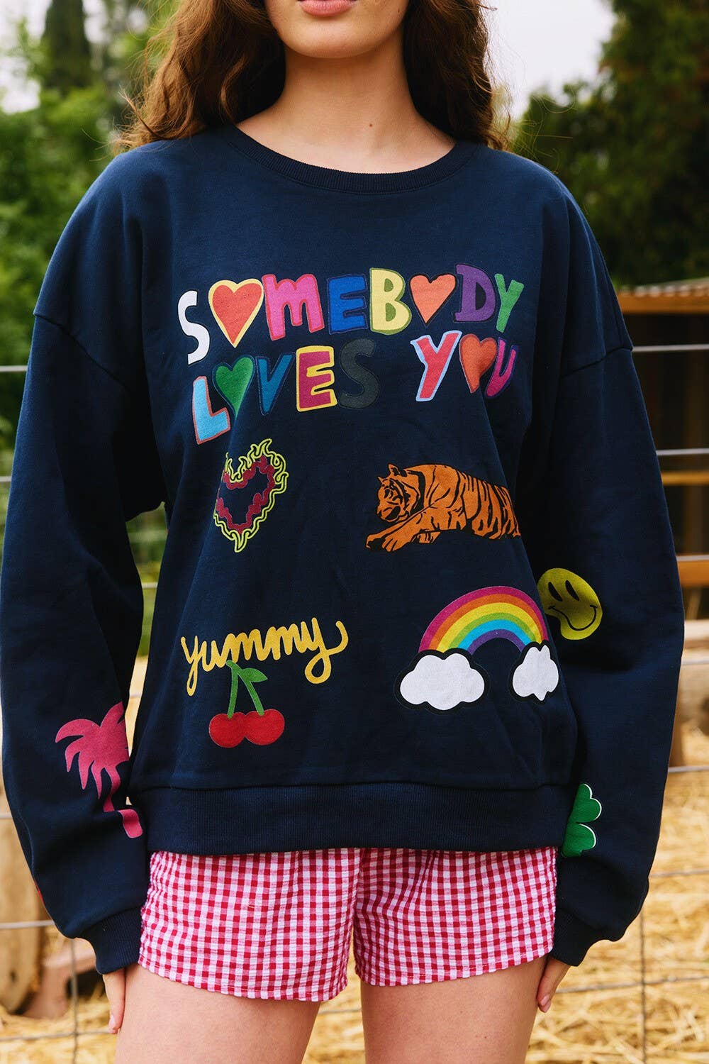 Somebody Loves You' Graphic Sweatshirts