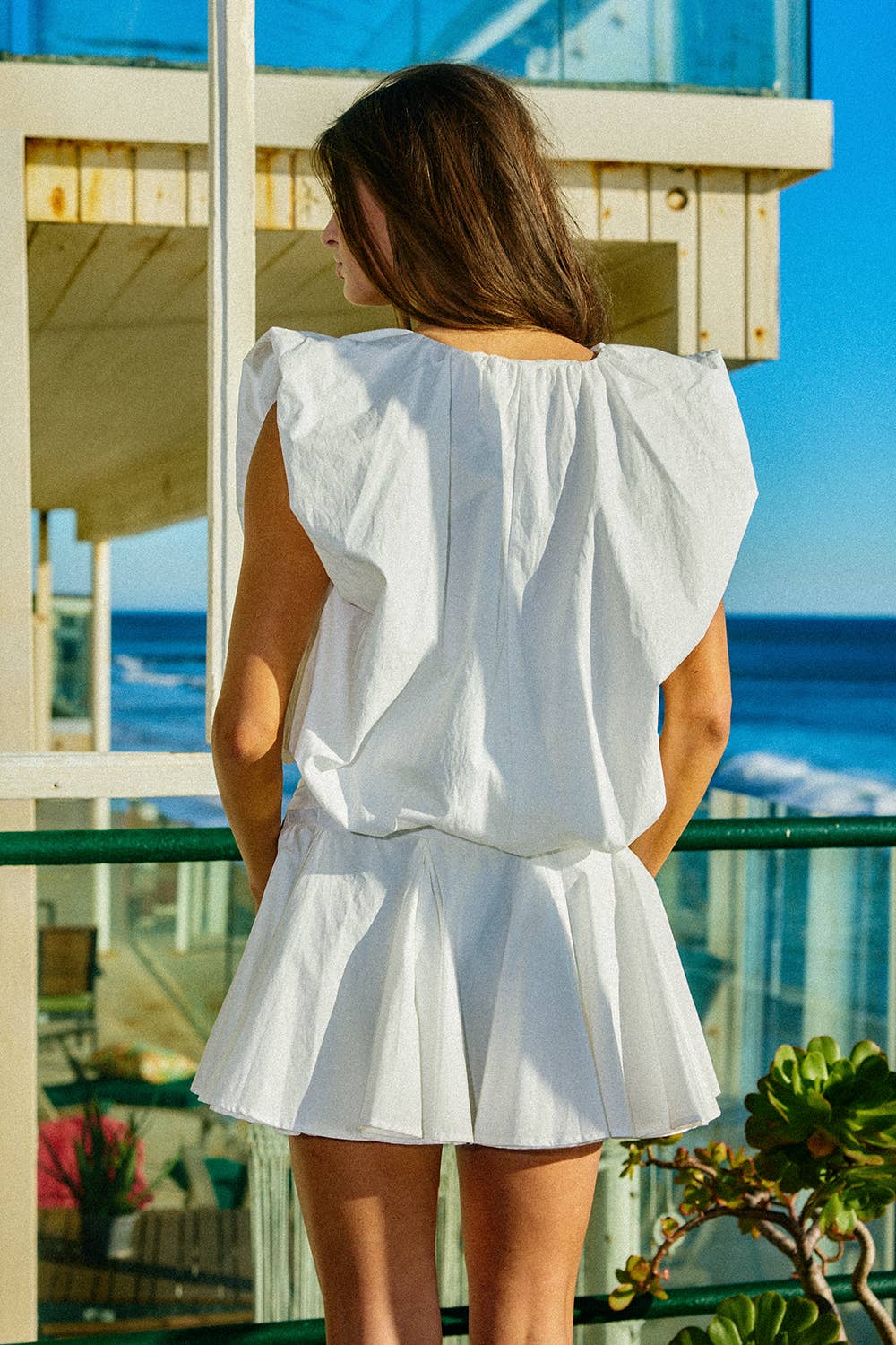 Bubble Hem Sleeveless Solid Woven Top